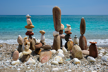 Image showing Concept of balance and harmony - pebble stone stacks on the beach