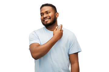 Image showing happy african american man with perfume