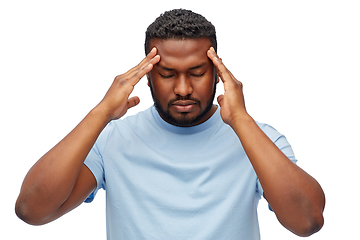 Image showing stressed young african american man with headache
