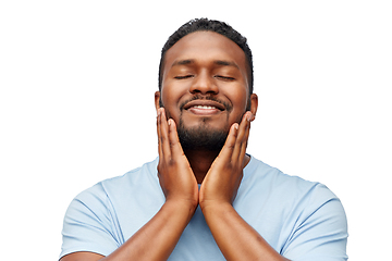 Image showing happy african american man touching his beard