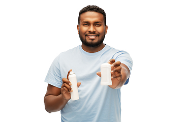Image showing african american man with antiperspirant deodorant