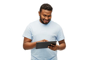 Image showing happy african american man with tablet computer