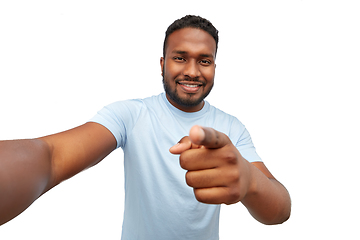 Image showing smiling young african american man taking selfie