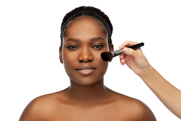 Image showing african woman and hand with make up brush