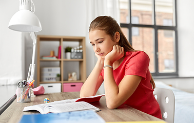 Image showing student teenage girl reading book at home