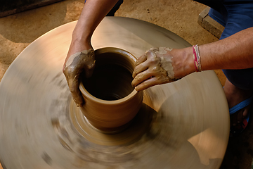 Image showing Indian potter hands at work, Shilpagram, Udaipur, Rajasthan, India