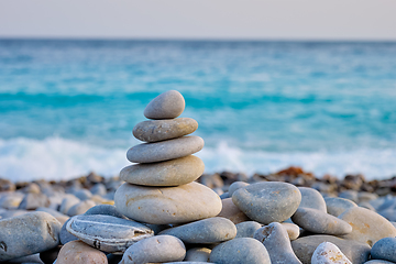 Image showing Zen balanced stones stack on beach