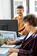 Image showing male creative worker with laptop working at office