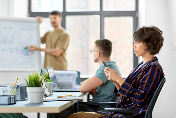 Image showing woman with smartphone at office conference