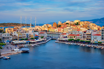 Image showing Beautiful Agios Nikolaos town on lake Voulismeni on sunset. island Crete, Greece