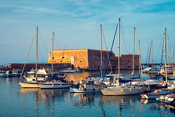 Image showing Venetian Fort in Heraklion and moored fishing boats, Crete Island, Greece