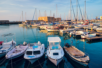 Image showing Venetian Fort in Heraklion and moored fishing boats, Crete Island, Greece