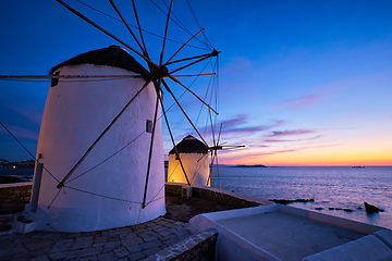 Image showing Traditional greek windmills on Mykonos island at sunrise, Cyclades, Greece