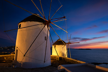 Image showing Traditional greek windmills on Mykonos island at sunrise, Cyclades, Greece