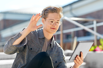 Image showing teenage boy with tablet computer having video call