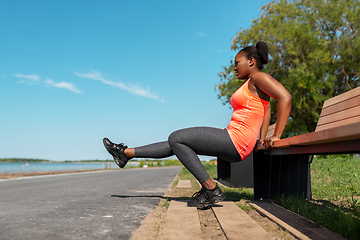 Image showing african american woman doing sports at seaside