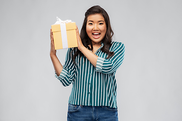 Image showing happy asian woman with birthday present