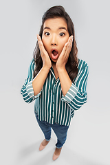 Image showing shocked asian woman with open mouth goggling