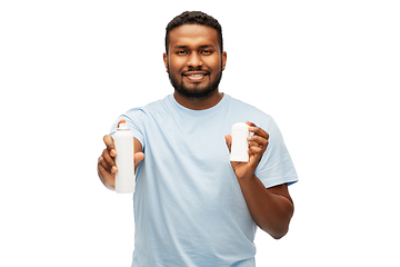 Image showing african american man with antiperspirant deodorant