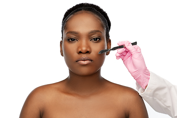 Image showing face of african american woman and scalpel knife