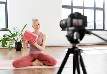 Image showing woman or sports blogger streaming online at home