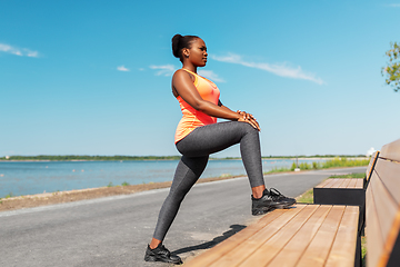 Image showing african american woman doing sports at seaside