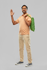 Image showing man with reusable canvas bag for food shopping