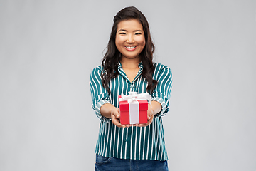 Image showing happy asian woman with birthday present