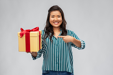 Image showing happy asian woman with birthday present