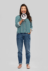 Image showing happy smiling asian woman speaking to megaphone