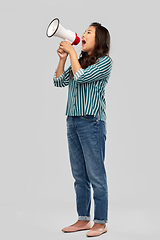 Image showing asian woman speaking to megaphone