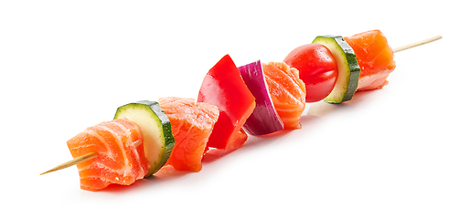 Image showing fresh raw salmon and vegetable skewer