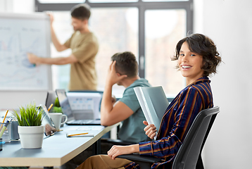 Image showing smiling businesswoman at office conference