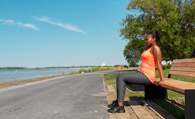 Image showing african american woman doing sports at seaside