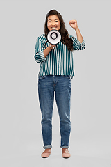 Image showing happy smiling asian woman speaking to megaphone