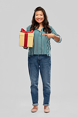 Image showing happy asian woman with birthday present