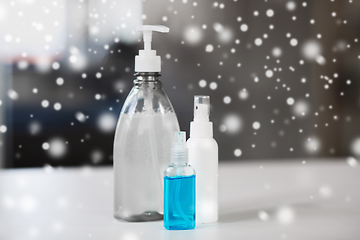 Image showing close up of different hand sanitizers on table