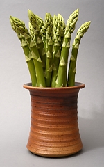 Image showing a bunch of asparagus in a ceramic pot 