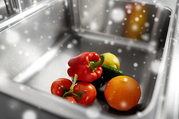 Image showing fruits and vegetables in kitchen sink