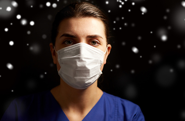 Image showing female doctor or nurse in medical face mask