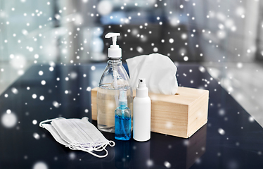 Image showing hand sanitizers, masks, liquid soap and tissues