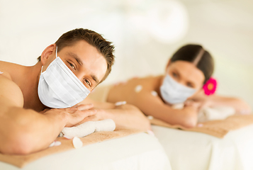 Image showing couple in masks at spa