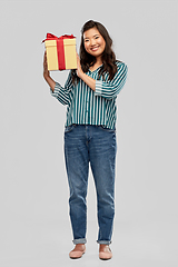 Image showing happy asian woman with birthday present