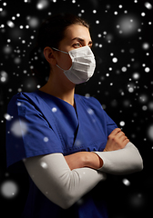 Image showing female doctor or nurse in medical face mask