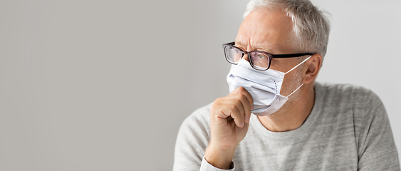 Image showing close up of senior man in glasses and medical mask