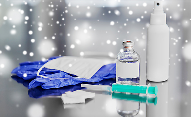 Image showing syringe, medicine, wound wipes, gloves and mask