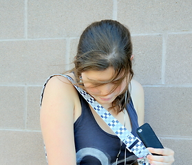 Image showing Female listening to music.