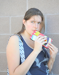 Image showing Female listening to music.