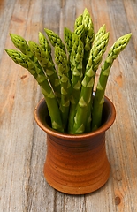 Image showing a bunch of asparagus in a ceramic pot