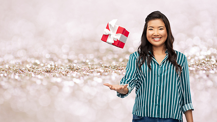 Image showing happy asian woman with birthday present